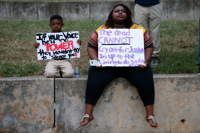 Residents gather for a vigil and march to protest the death of Keith Lamont Scott on Sept. 21, 2016, in Charlotte, N.C.Brian Blanco/Getty Images